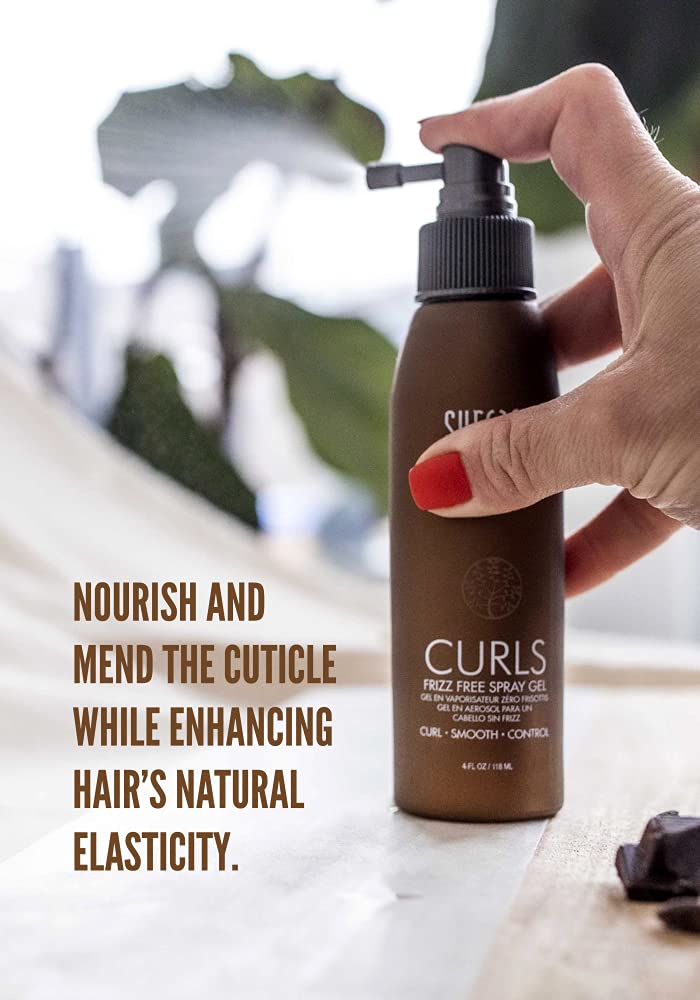 SURFACE on defined curls in use demonstrating frizz control and enhanced definition