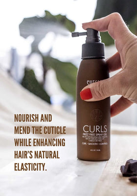 SURFACE on defined curls in use demonstrating frizz control and enhanced definition