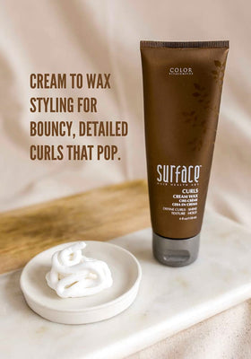SURFACE applying cream-wax to curly hair demonstrating enhanced curl definition and control
