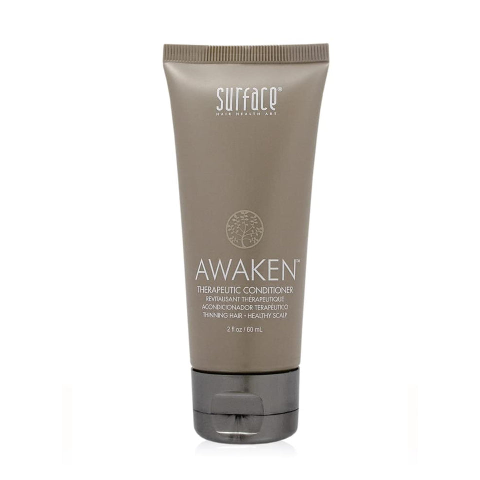 SURFACE front packaging of 2 fl oz bottle showing product name and compact design benefit