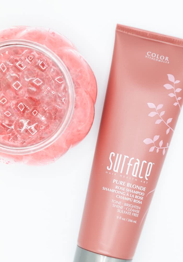 SURFACE Pure Blonde Rose shampoo lather in hand demonstrating gentle cleansing and violet pigment payoff