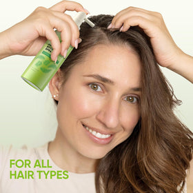 Svvimer leave-in spray being applied to hair for lift and manageability