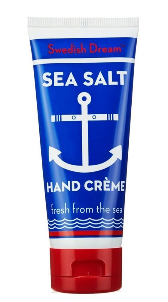 Swedish Dream hand creme applied to hands demonstrating quick absorption benefit