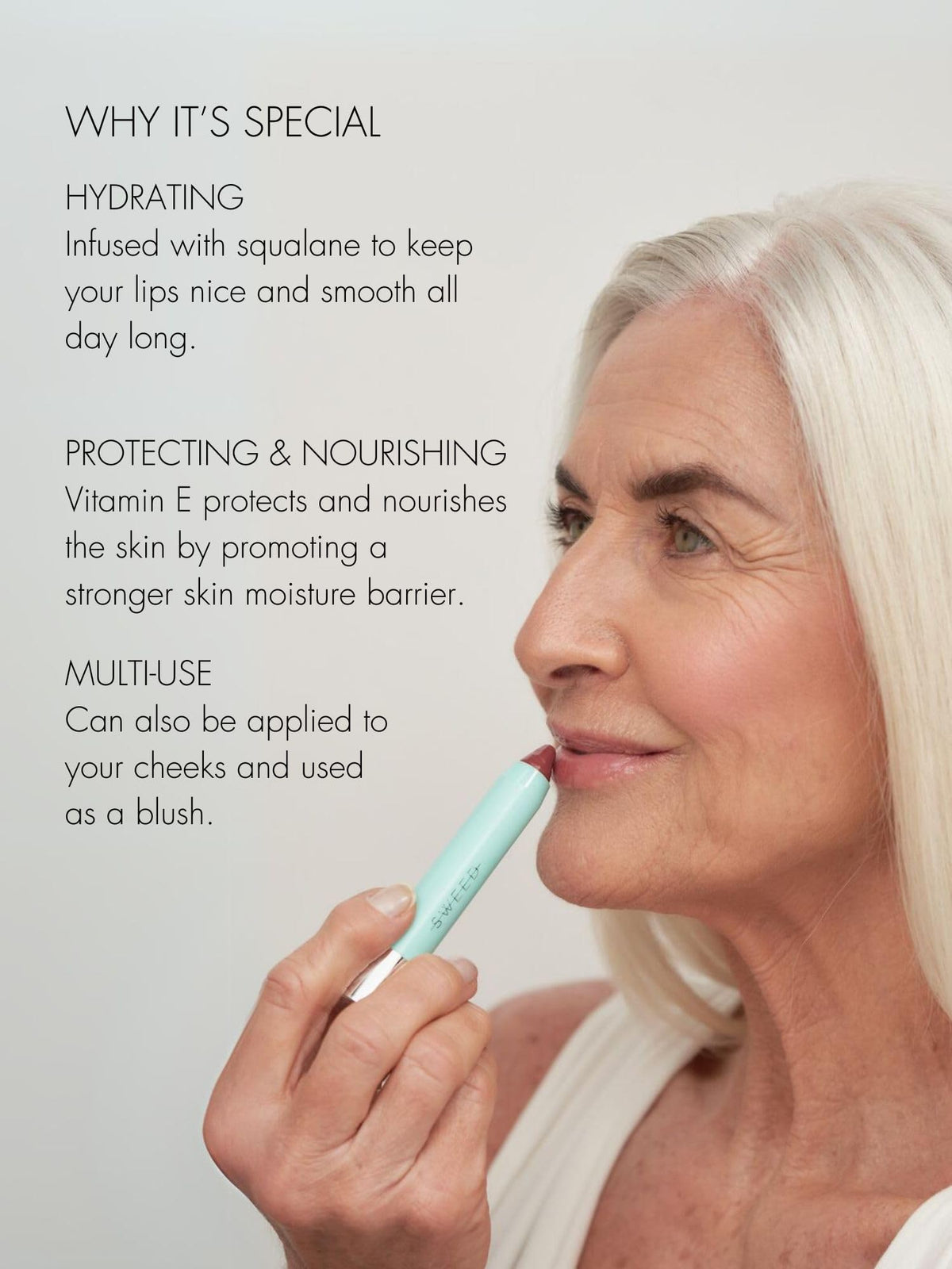 Sweed lipstick held in hand to show size and scale for easy portability and on-the-go use