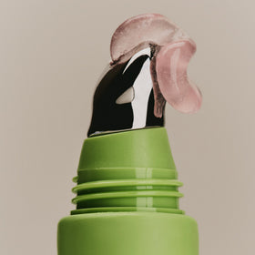 SWEET JULY lip treatment open cap revealing smooth balm texture for easy application