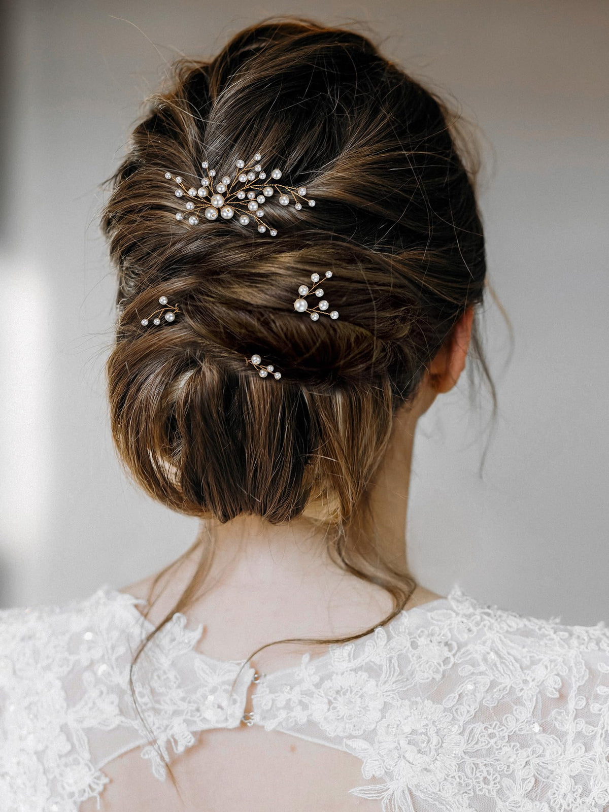 SWEETV cluster of pins in low bun, creating elegant decoration