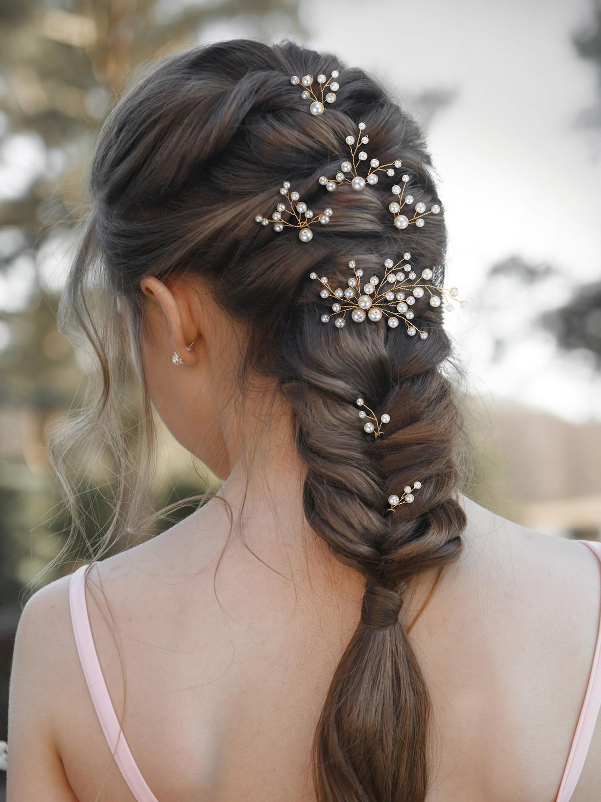 SWEETV close-up of pearls and rhinestones, showing delicate shine