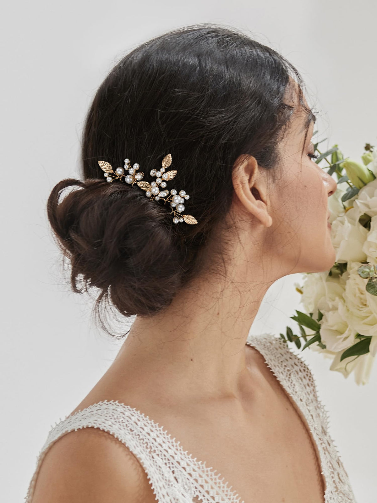 SWEETV close-up of pearls and rhinestones highlighting fine detail and sparkle