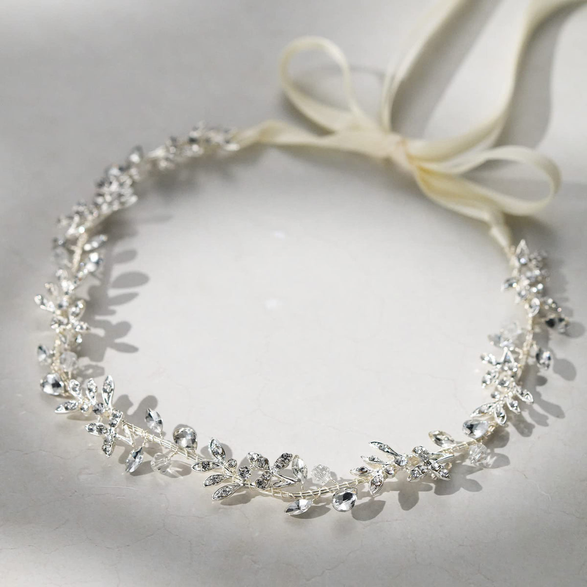 SWEETV headband worn in half‑up hairstyle adding delicate sparkle