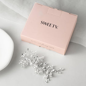 SWEETV comb worn in bridal updo demonstrates secure decorative hold