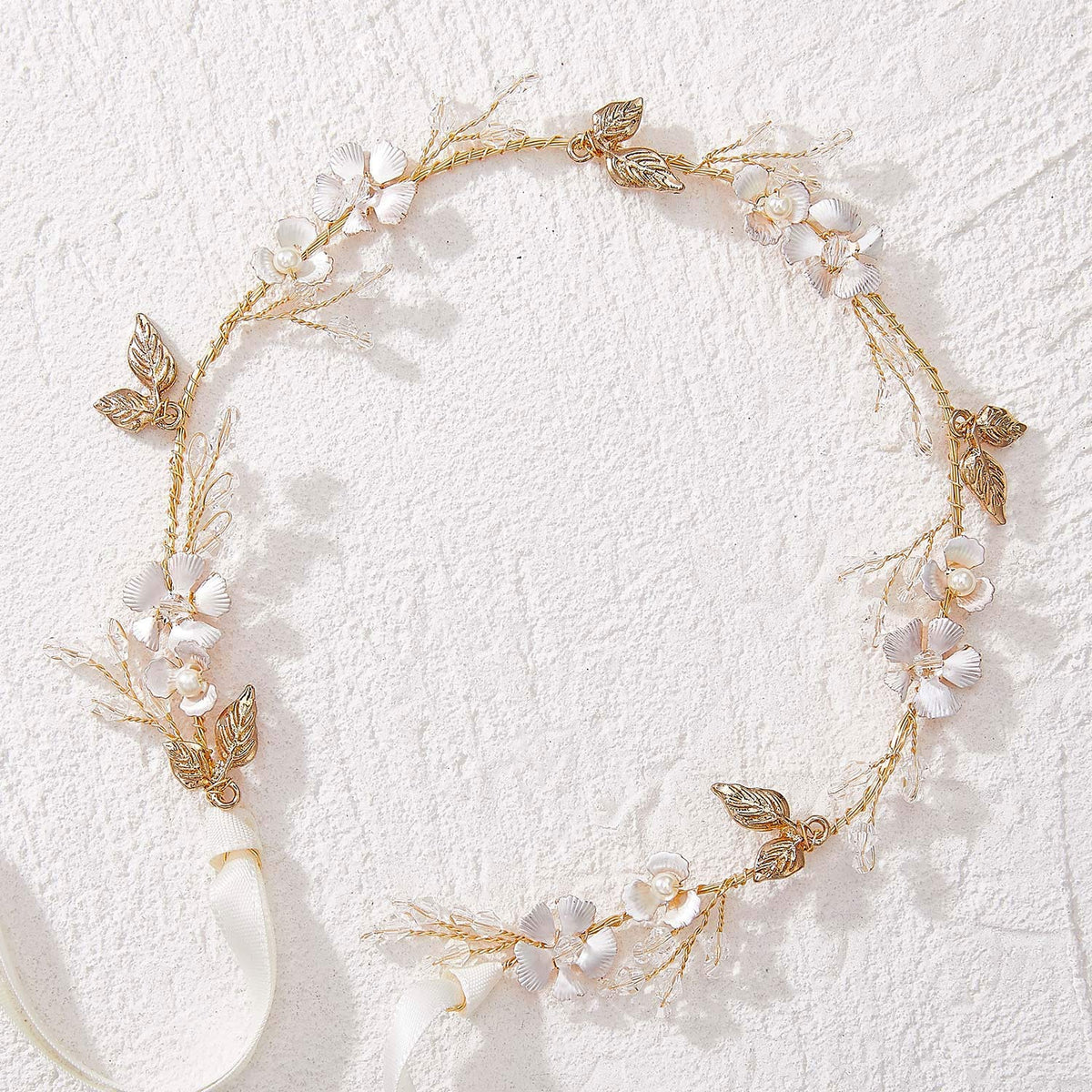 SWEETV headband worn in a bridal updo demonstrating how it complements hairstyles