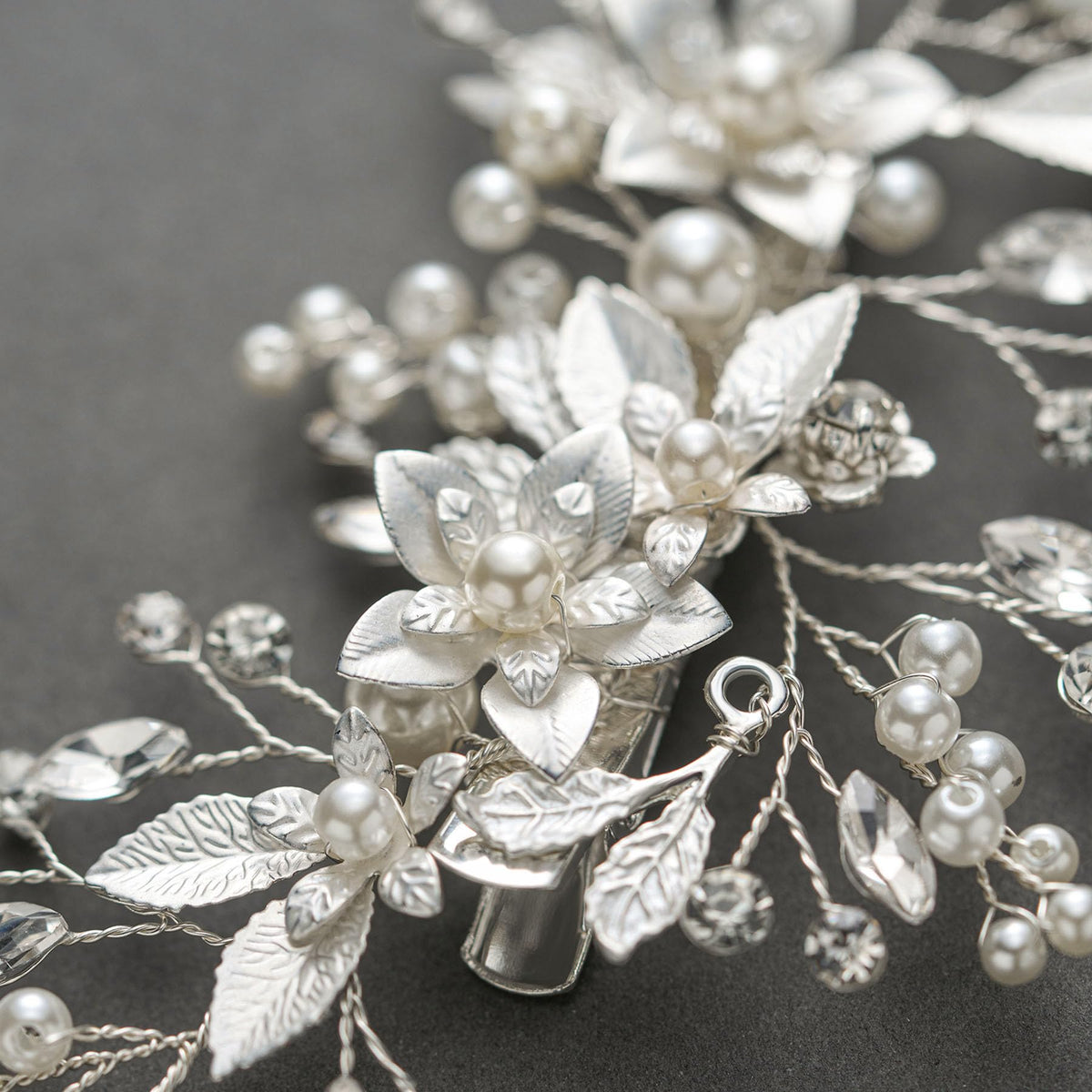 SWEETV worn in a bride half-up hairstyle adding floral accent and soft glamour benefit