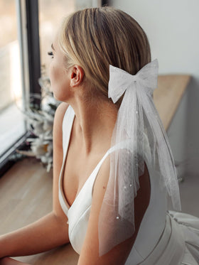 SWEETV pearls on tulle close-up highlighting secure attachment and sparkle