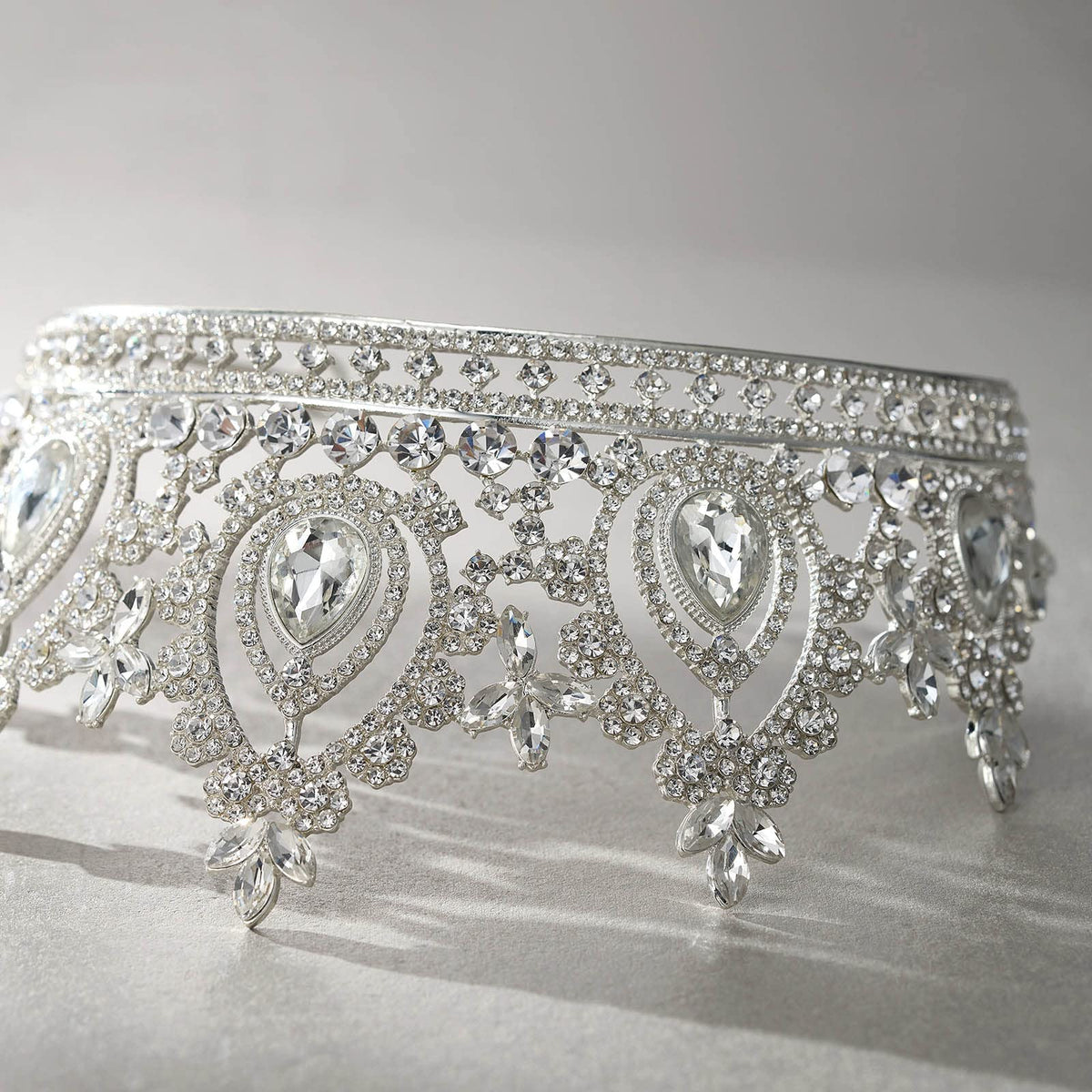 SWEETV tiara next to ruler demonstrating compact size and portability