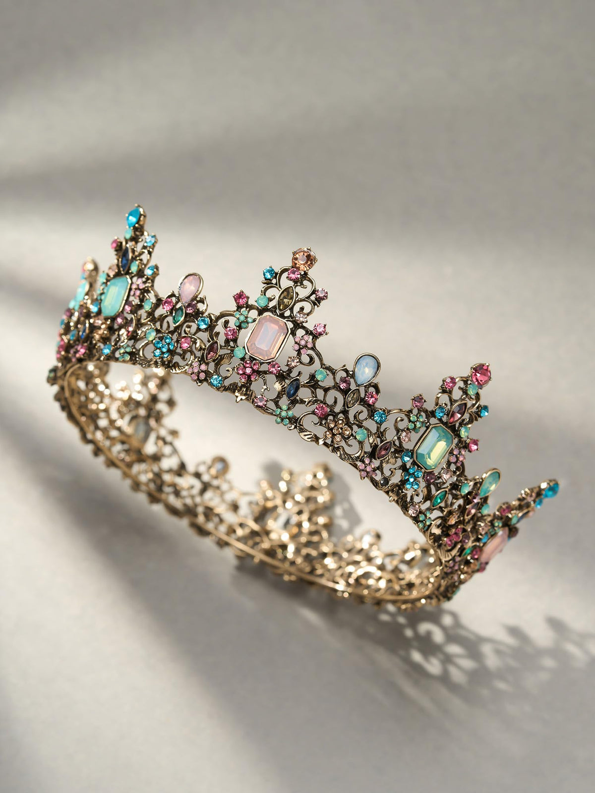 SWEETV crown held in hand demonstrating size and substantial feel
