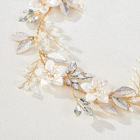 SWEETV headpiece held in hand showing compact 32x4 cm size for scale