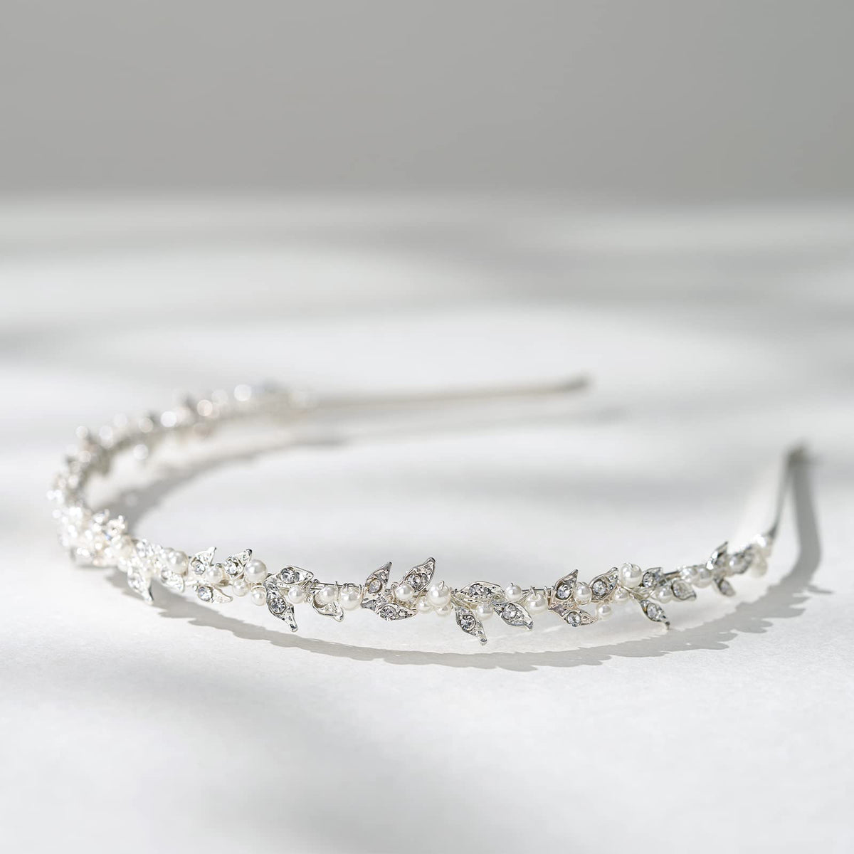 SWEETV headband beside a ruler, provides scale so buyers judge size accurately
