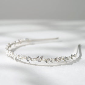 SWEETV headband beside a ruler, provides scale so buyers judge size accurately