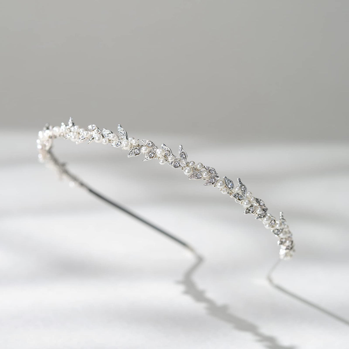 SWEETV headband with veil on model, demonstrates veil compatibility and polish