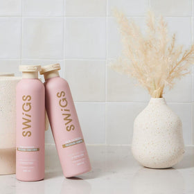swigs lifestyle on dresser near mirror, suggests daily maintenance and polished look