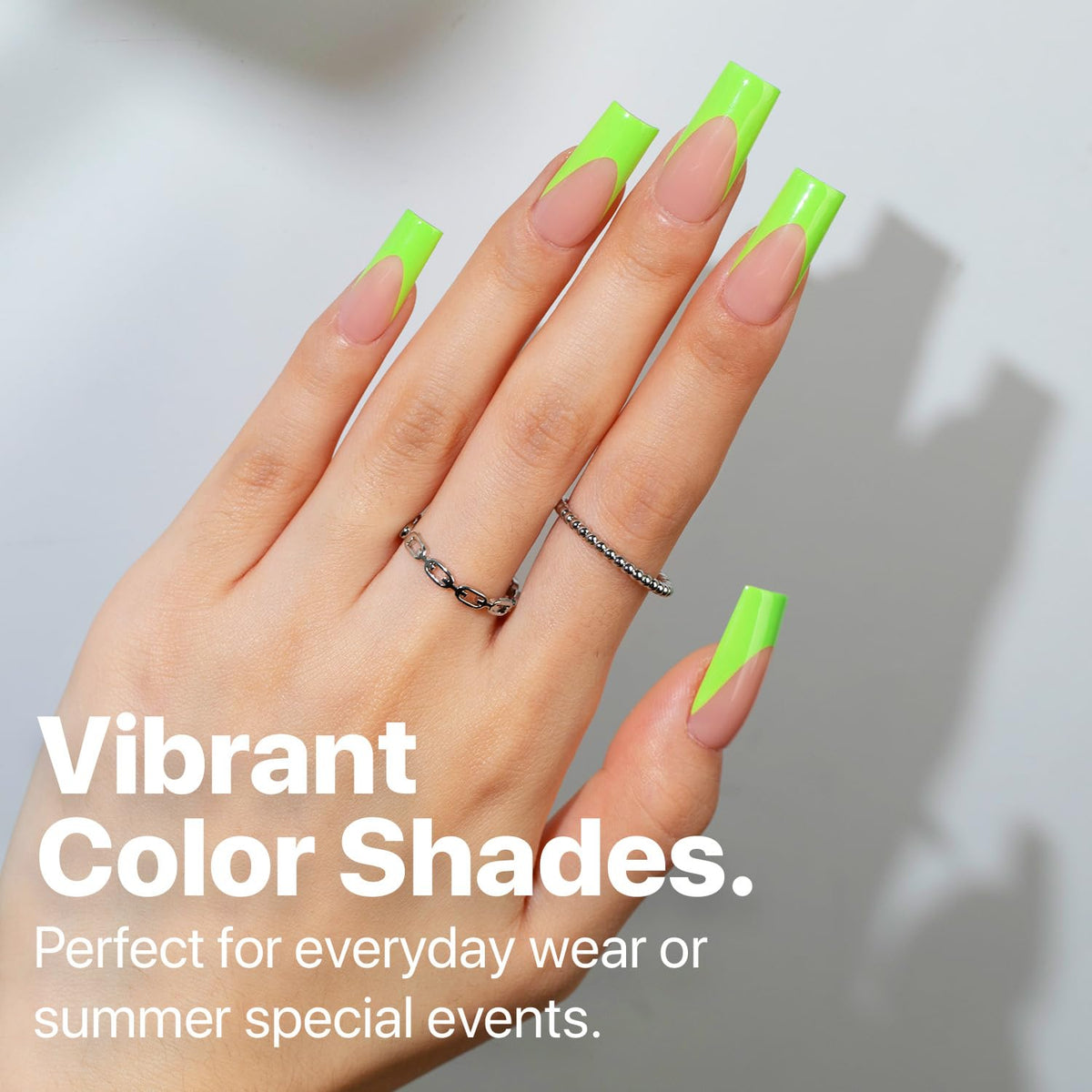 SXC press-on nails glowing on hand in low light benefit eye-catching effect