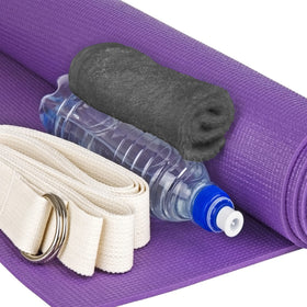 T & L towel tucked in gym bag showing portability and post-workout readiness