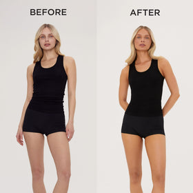 TAN-LUXE mist spraying from bottle demonstrating fast, even application