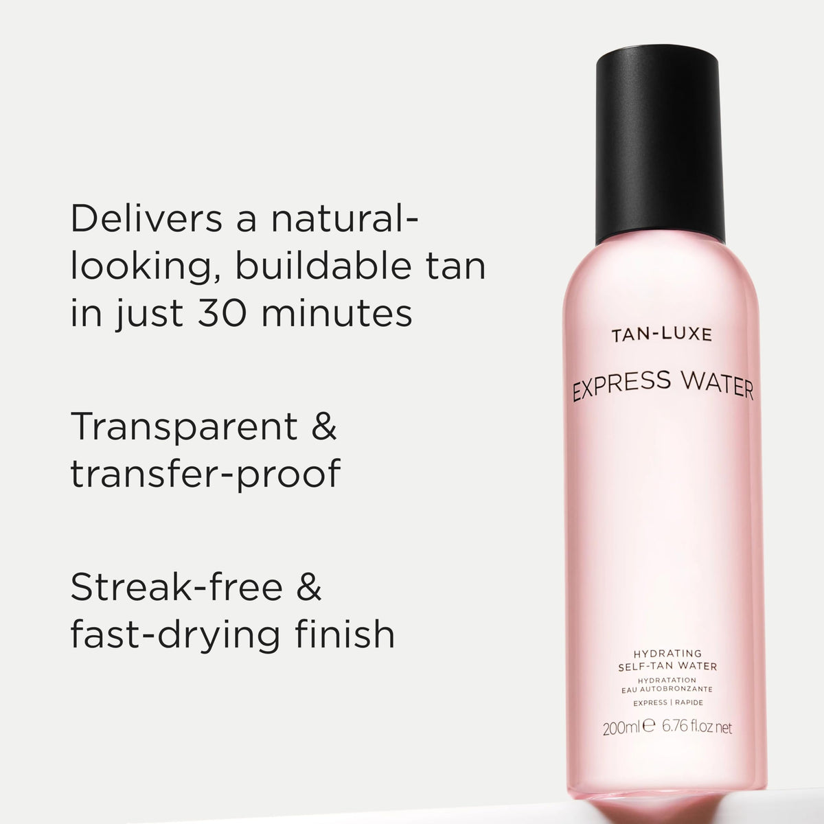 TAN-LUXE droplet on skin showing transparent texture and quick dry