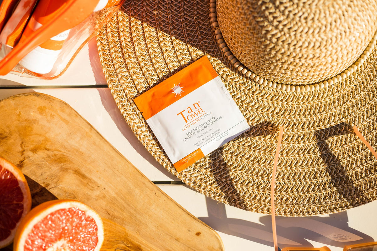 Close-up Tan Towel towelette texture showing clear formula for smooth streak-free application