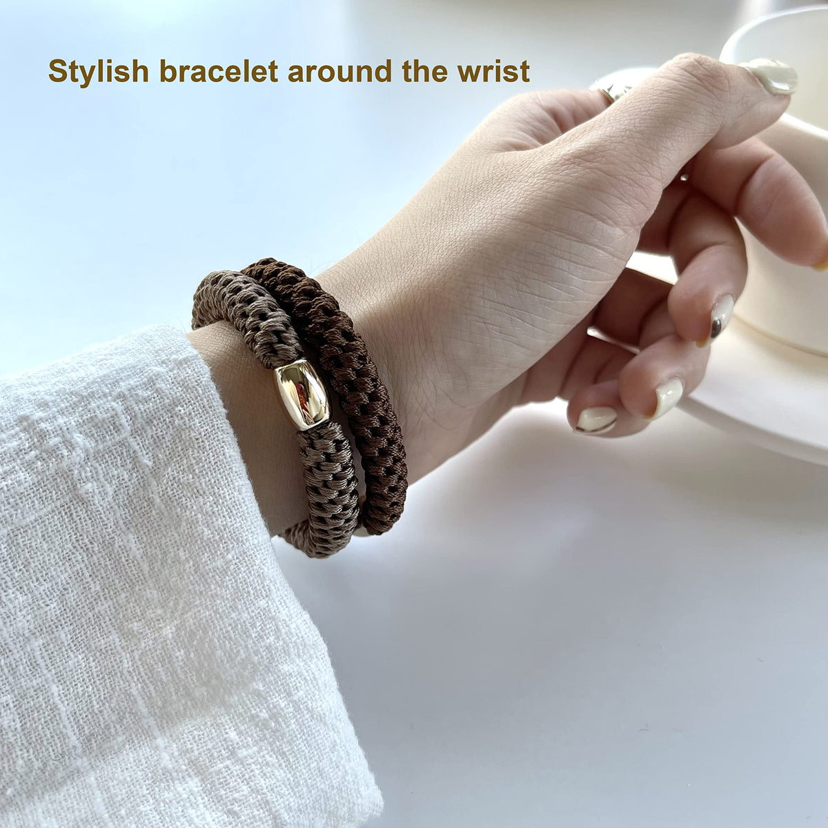 Tanha hair tie used in a high ponytail on thick hair demonstrating firm no-slip hold