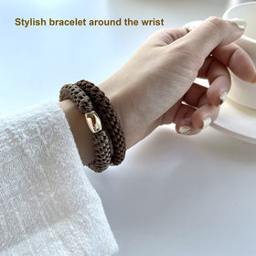 Tanha hair tie used in a high ponytail on thick hair demonstrating firm no-slip hold