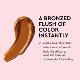 Tanologist swatch on arm showing buildable bronze and realistic color