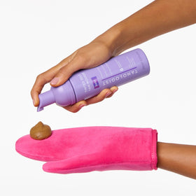 Tanologist close-up arm showing smooth, streak-free tan and even fade