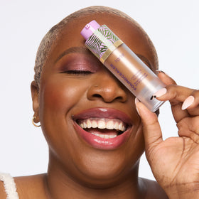 tarte application with damp sponge showing seamless blending and natural finish