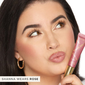 tarte rose shade swatch on arm demonstrating buildable color and glow