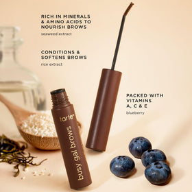 tarte tube in a morning bag by a mirror for fast on-the-go styling