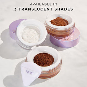 tarte creaseless setting powder next to coin to illustrate full-size scale