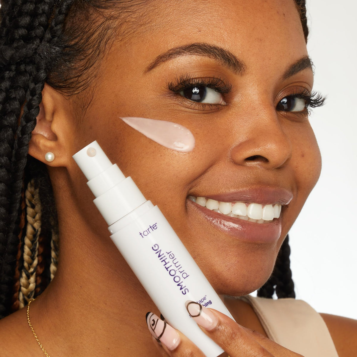 tarte primer applied with fingers demonstrating easy blending benefit