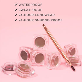 tarte jar surrounded by babassu and vitamin E to highlight conditioning benefits