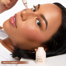 tarte close-up of five-prong applicator highlighting precise stamped freckles