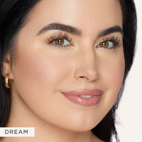 tarte glow wand on model cheekbone illustrating natural radiance benefit