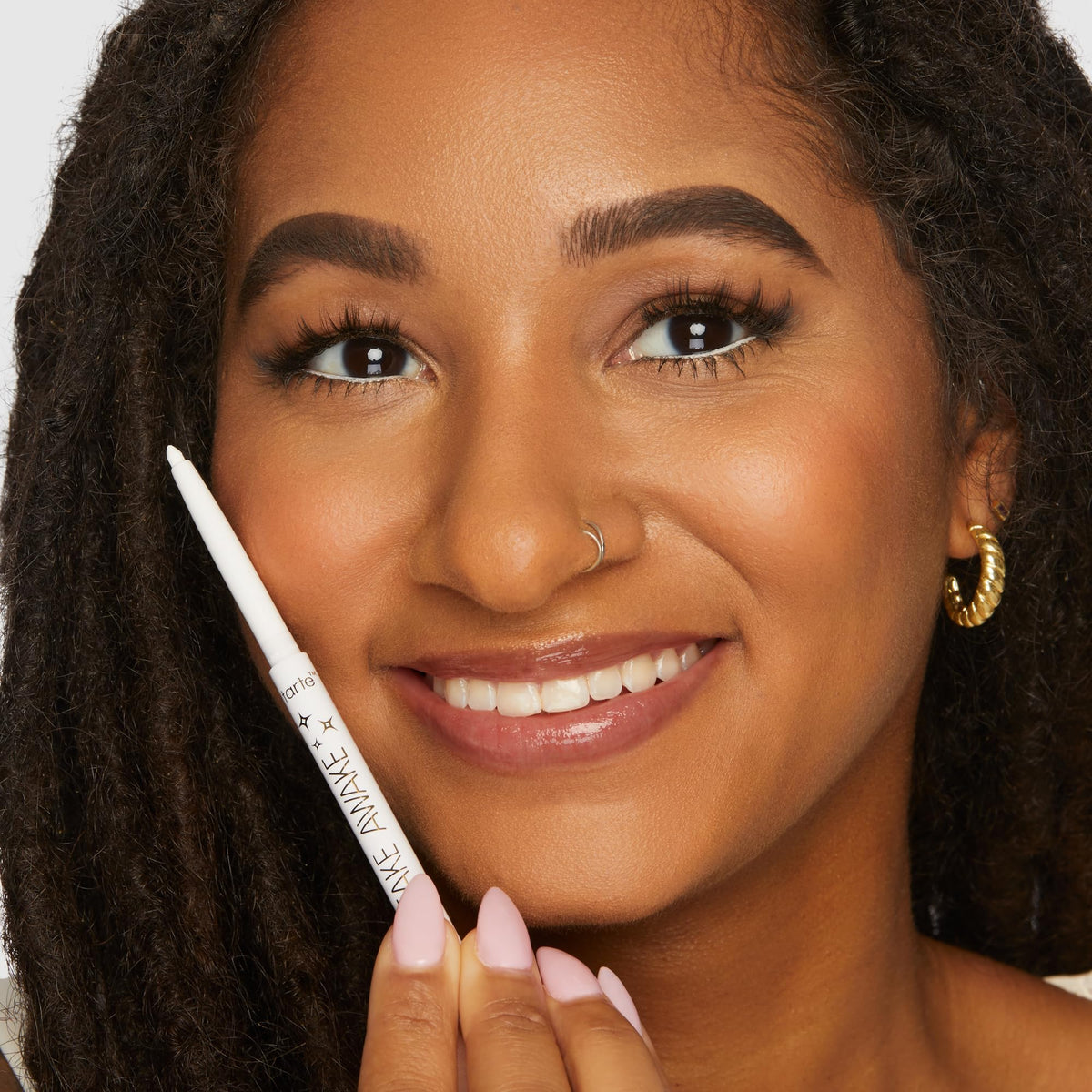 tarte lifestyle bag shot pencil in makeup bag convenient for quick touch-ups