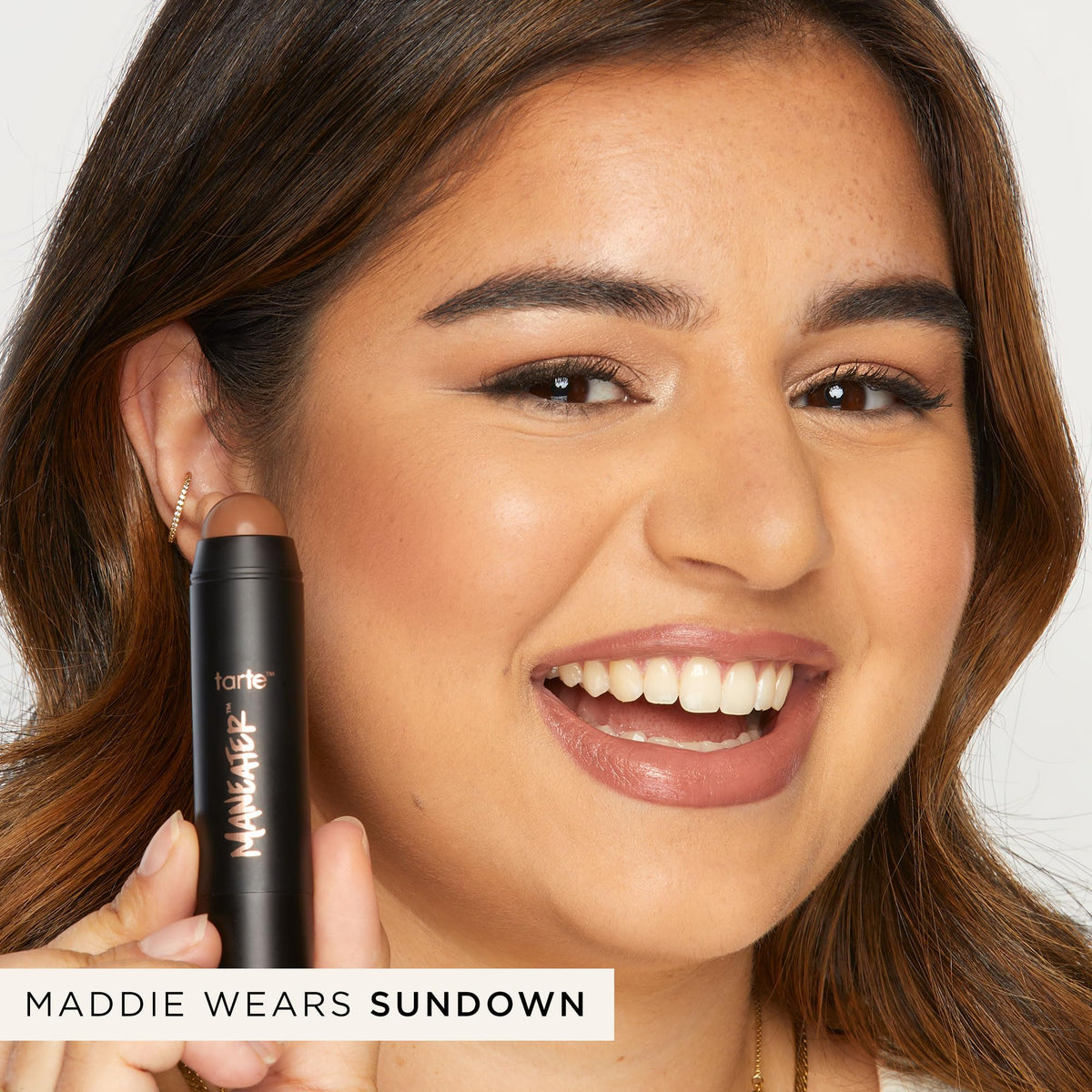 tarte bronzer next to brush and sponge showing versatile application methods