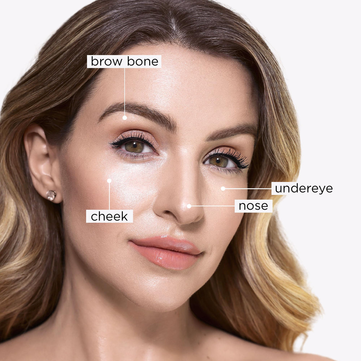 tarte highlighting pen on cheekbone for lifted, natural radiance