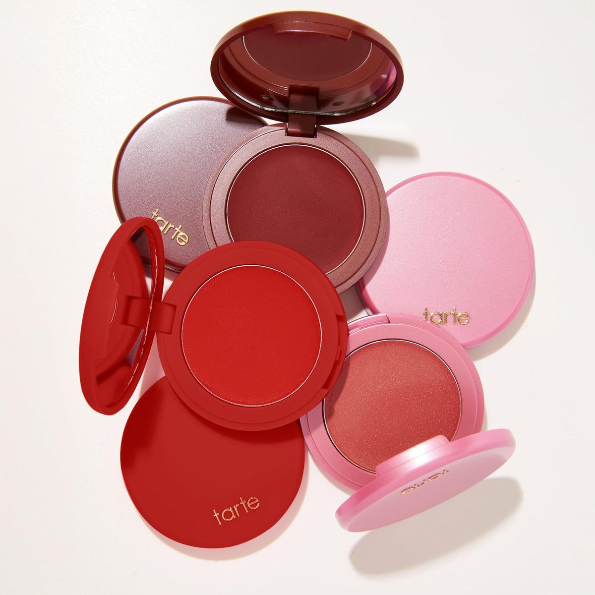 tarte application with fingers blending blush for seamless second-skin finish