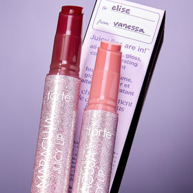 tarte passion fruit balm tube close-up showing vibrant tint and shine benefit