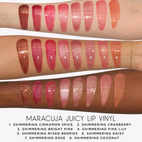 tarte gloss held in hand to show full-size scale and travel readiness