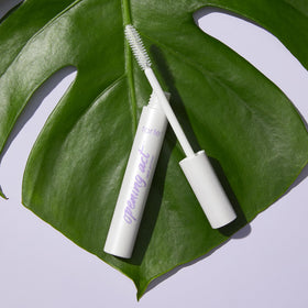 tarte white-tinted primer stroke showing texture and buildable coverage benefits
