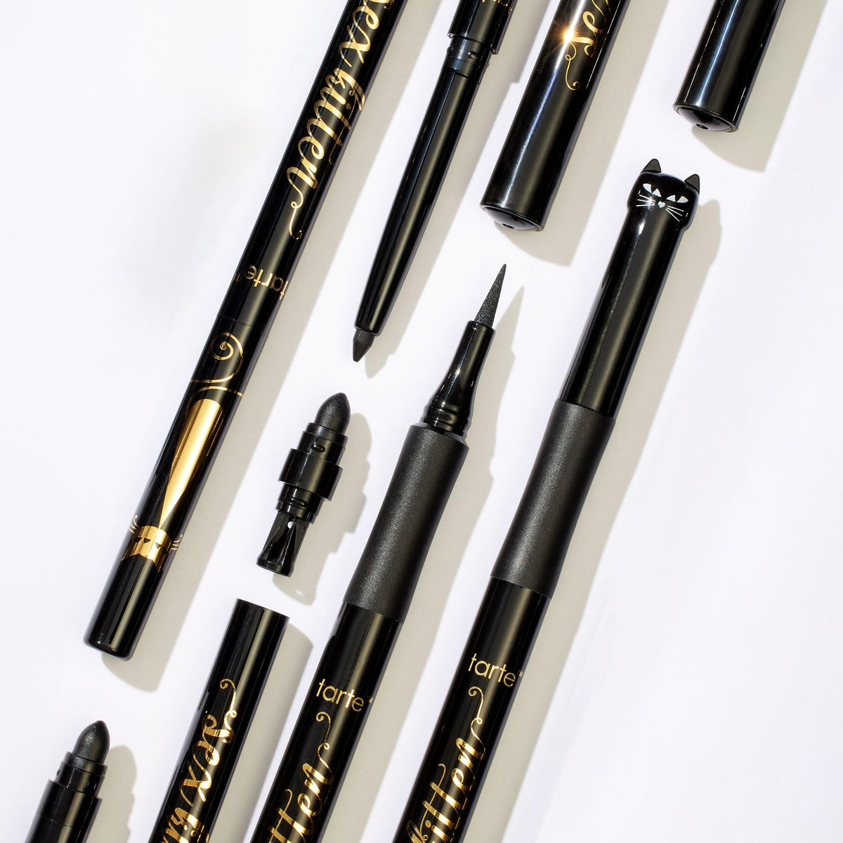 tarte flatlay with liner and makeup tools for travel-ready kit benefit: portable and versatile