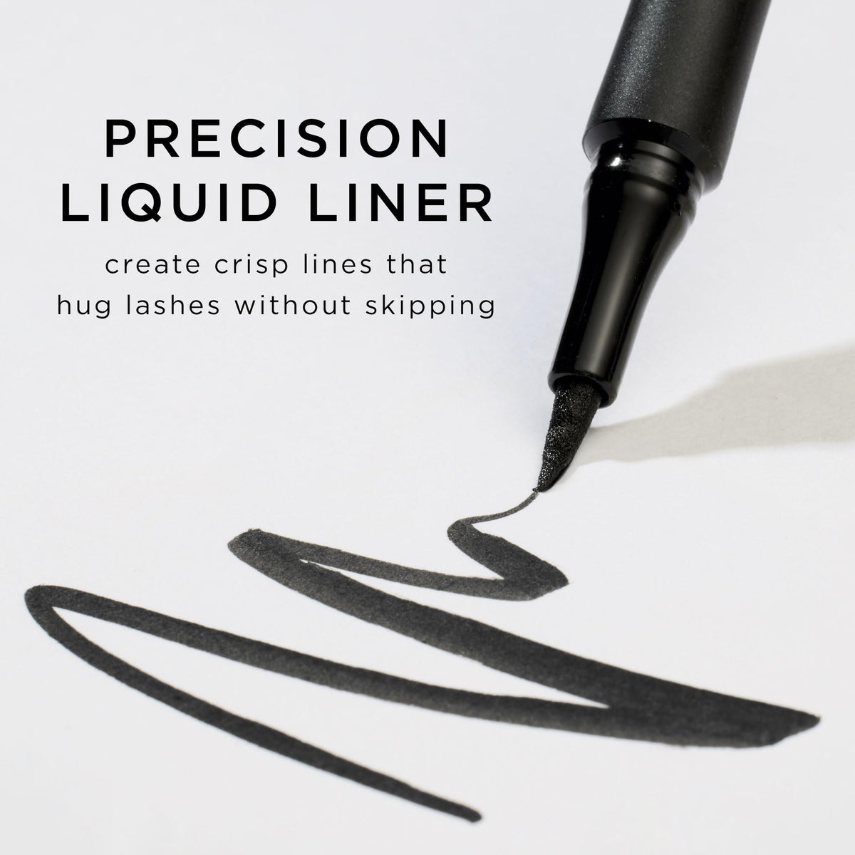 tarte black liner stroke on skin showing triple-black payoff benefit: intense color payoff